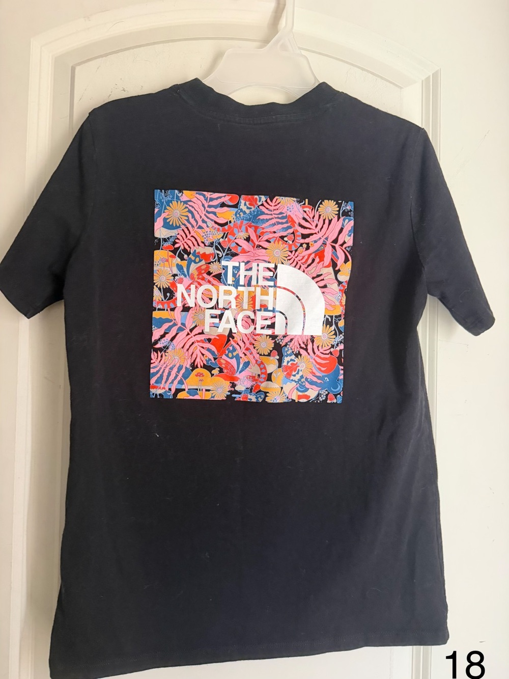 The North Face Black Tee with Bright Tropical Logo